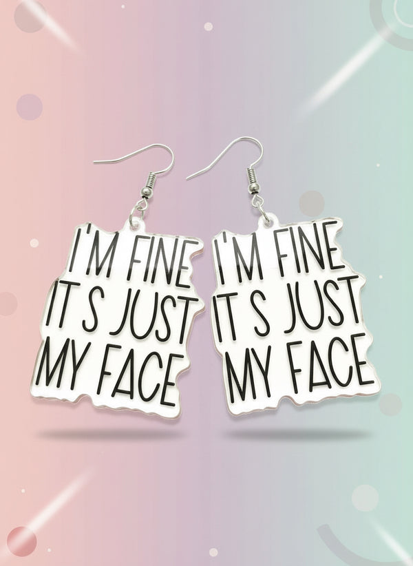 Earrings with humorous text on a colorful card