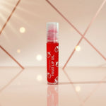 Fruit Lip Oil in a sleek red tube for hydrated, smooth, and glossy lips with fruity extracts.