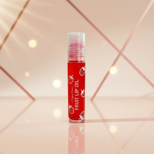 Fruit Lip Oil in a sleek red tube for hydrated, smooth, and glossy lips with fruity extracts.