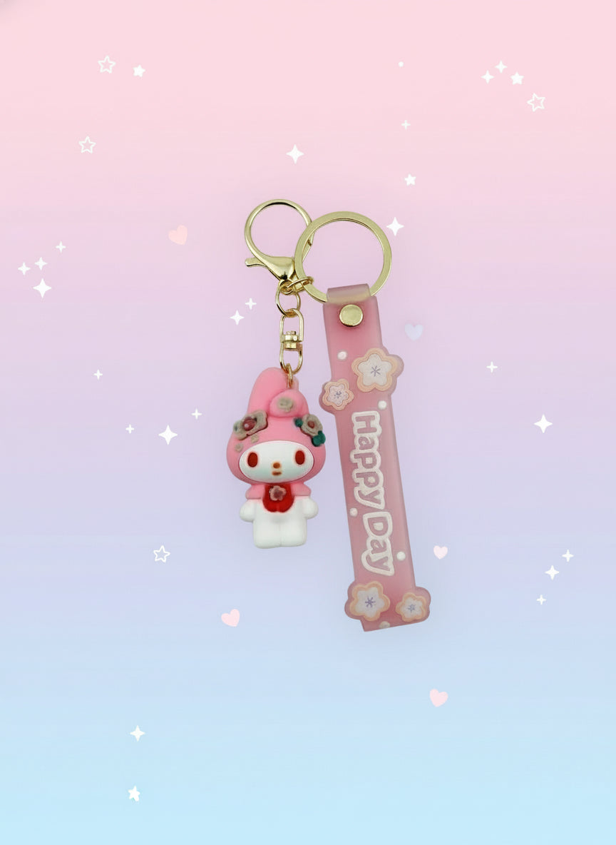 Pink keychain with a cartoon character on a white background