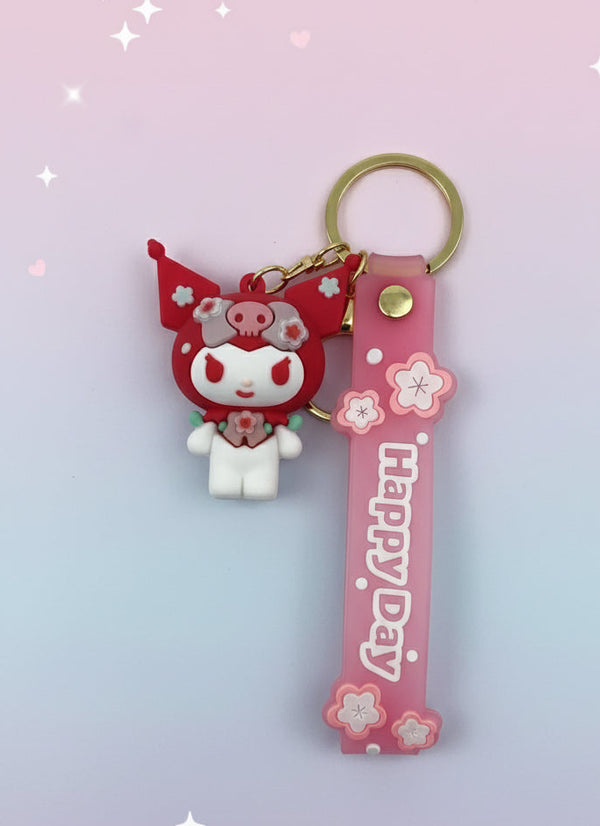 Keychain with cartoon character and 'Happy Day' tag on a white background