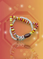 Handmade bead bracelets featuring colorful beads and football charm, perfect for game day and everyday wear.