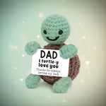 Emotional Support Turtle holding a sign that says 'DAD I turtle-y love you' for heartfelt gifting.