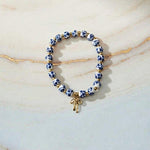Blue and White Porcelain Beaded Bracelet with Red Bow Charm