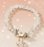 Floral crystal beaded bracelet featuring sparkling beads and floral accents, perfect for vintage-inspired elegance.