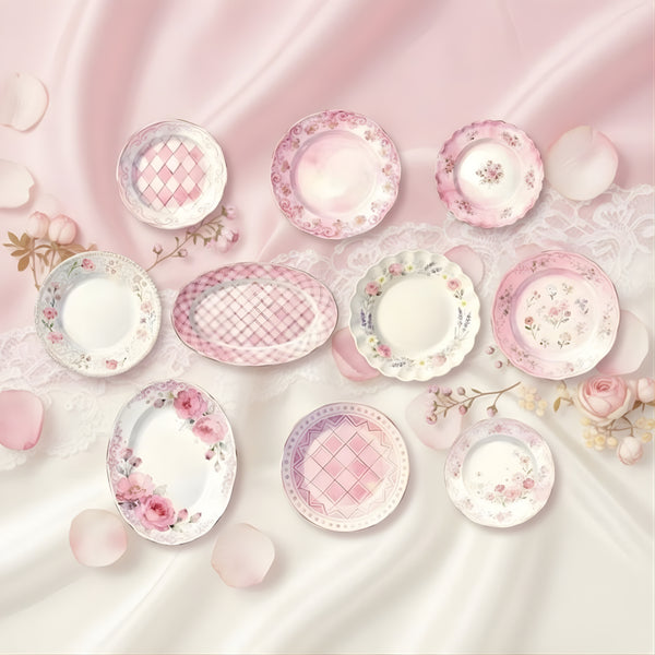 Round note dots scrapbooking ephemera (10pcs) arranged on delicate pink fabric with floral patterns.