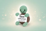 Emotional Support Turtle holding a sign that says 'Niece I turtle-g love you' for comfort and encouragement.