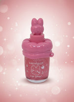 FANTYCHIC Gloss Lip Shine – Clear Sparkle Lip Gloss in Rabbit Tube on a pink background with sparkling effects.