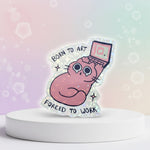 Born to art forced to work cat sticker featuring a cute cat design with a laptop and holographic sparkle.