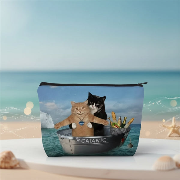 Funny cat makeup bag featuring two cats in a boat with the name 'CATANIC' for a humorous touch.