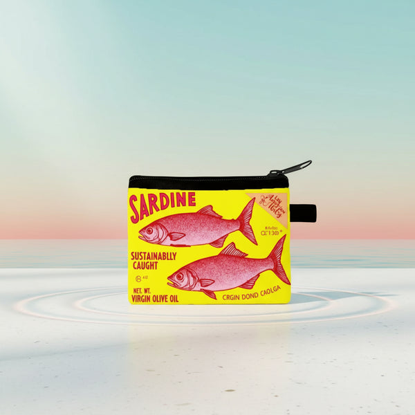 Vintage sardine coin purse featuring bright yellow sardine graphic and zipper closure on a pastel background.