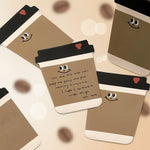 Coffee cup sticky notes with cute faces and handwritten messages for reminders and to-dos.