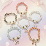 Floral crystal beaded bracelet set featuring vintage-inspired designs in assorted colors and floral accents.