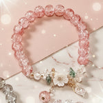 Floral crystal beaded bracelet featuring sparkling pink beads and delicate floral accents, designed for everyday elegance.