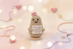 Emotional support potato plushie with a smile and a motivational note, surrounded by soft pastel colors and decorations.