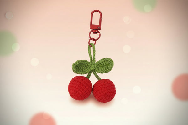 Crochet cherry keychain, handmade bag charm, colorful accessory for keys, purse, and backpacks by Craft-N-Crumble®.