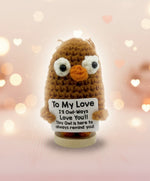 Emotional support owl crochet plush with love message, standing on a wooden base, by Craft-N-Crumble®. Emotional support owl.