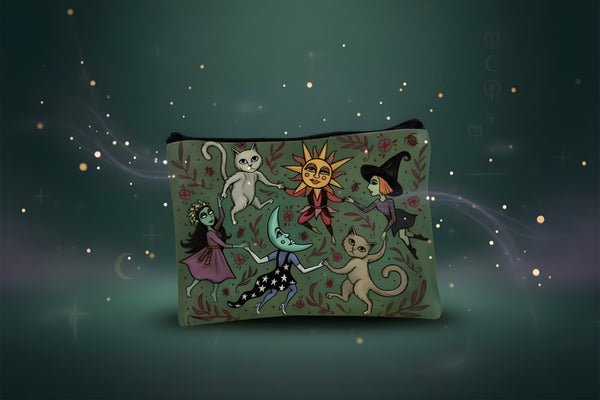 Enchanted forest makeup bag featuring whimsical cats, sun, and floral designs on a dark green background.