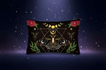 Moth makeup bag featuring celestial butterfly design with flowers and mystical elements on a black background.