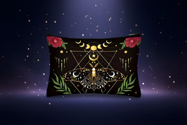 Moth makeup bag featuring celestial butterfly design with flowers and mystical elements on a black background.