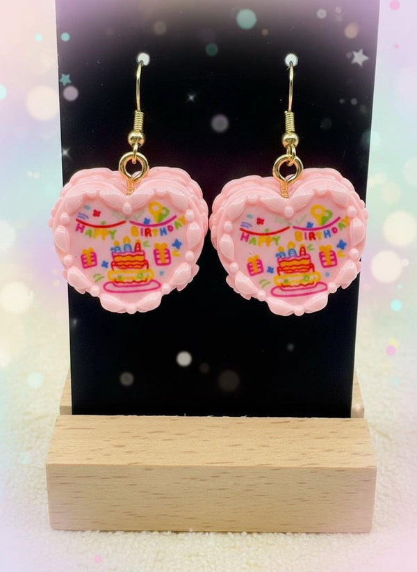 Mini Resin Cake Earrings – Handmade dessert jewelry featuring colorful birthday cake design in heart shape.