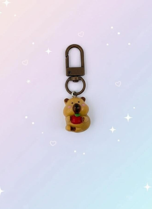 Keychain with bear design in clear packaging on a white background