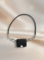 black and white labubu purse