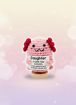 Emotional Support Axolotl by Craft-N-Crumble, a crochet companion holding a love message for daughters.