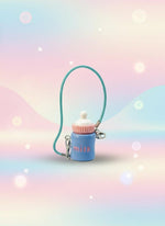 Blue baby bottle keychain with pink cap on a white background