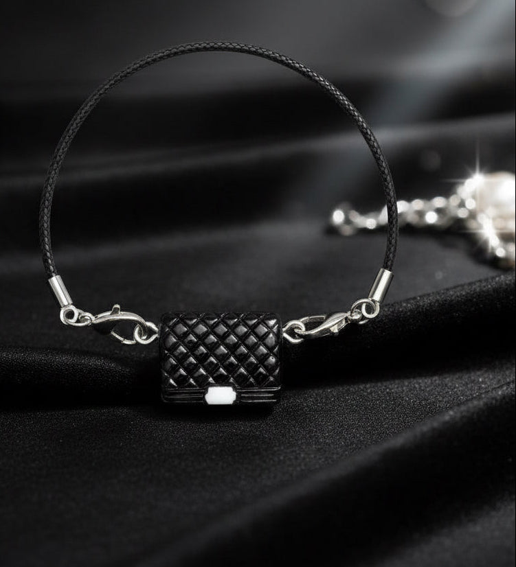 black and white labubu purse