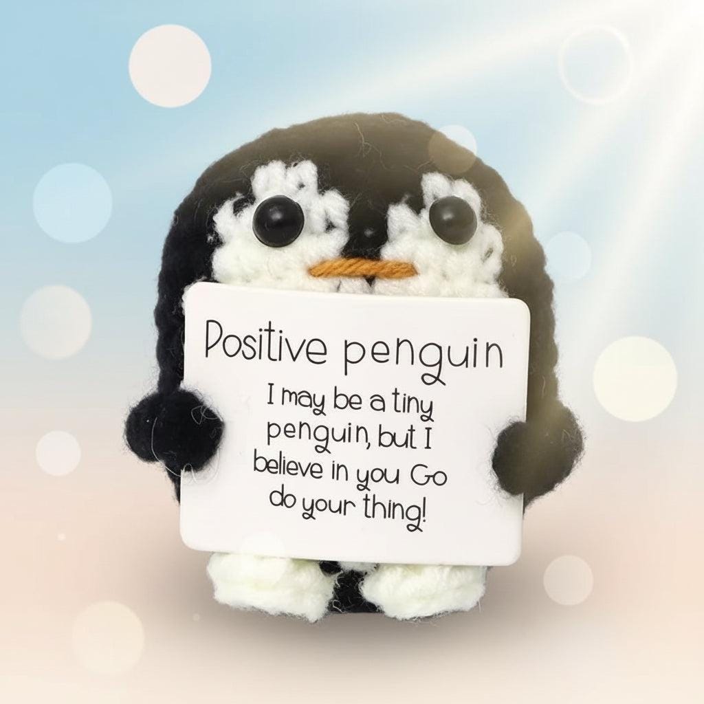 Positive Penguin Crochet Plush with Wooden Stand holding a motivational sign for desk decor.