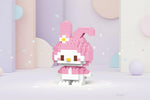 Kawaii mini building blocks set featuring a cute pink character with bunny ears in a playful pastel background.