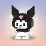 Kawaii mini building blocks in the shape of a cute character with black ears and a pink bow.